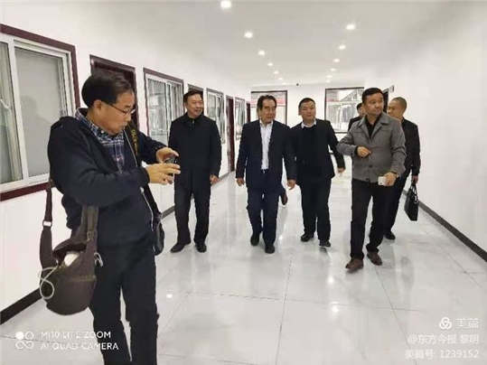 河南省人民政府参事、中国国际新闻杂志社总编辑肖继业赴新郑市河南正聚明汽贸公司视察调研